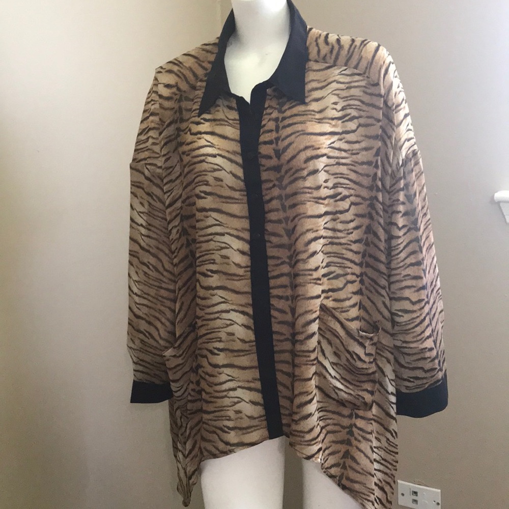 Get your Tiger Queen on in this sheer blouse